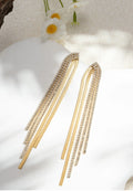 Boucles d’oreilles longues dorées et strass