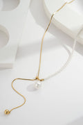 Collier asymétrique coulissant perlé